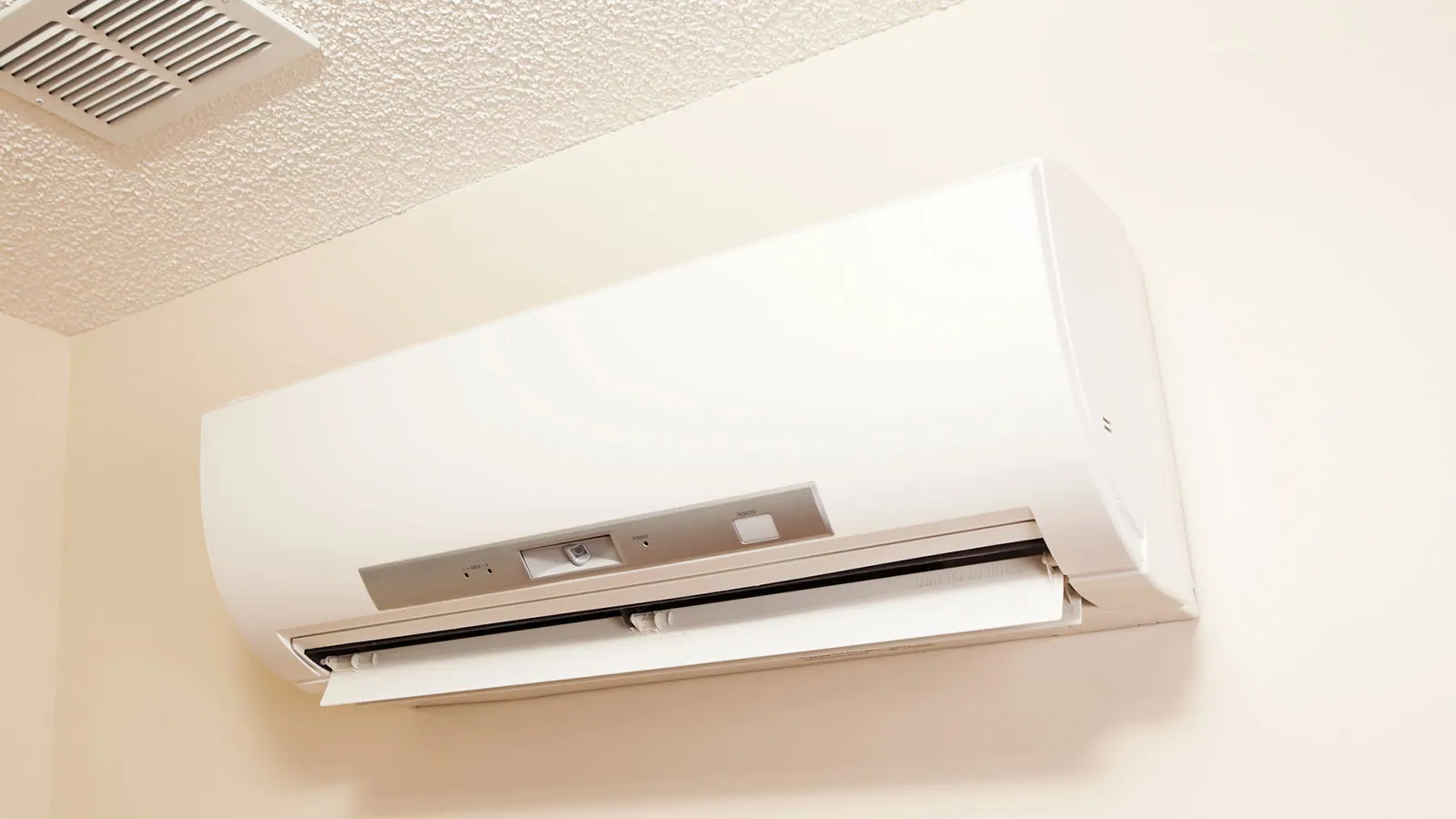 A ductless mini-split indoor unit on a wall