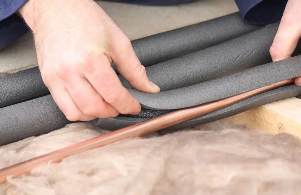 Insulating water heater pipes