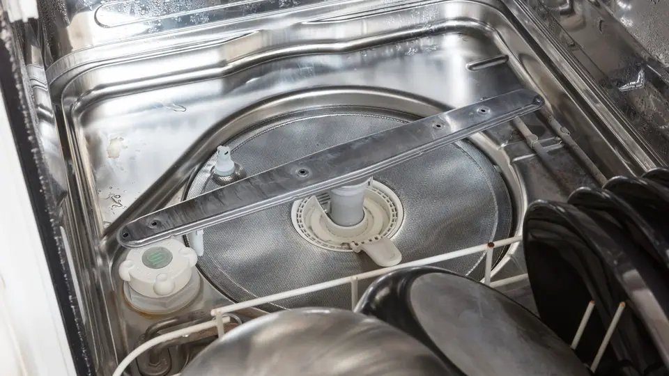 Limescale from hard water built up on a metal heating element