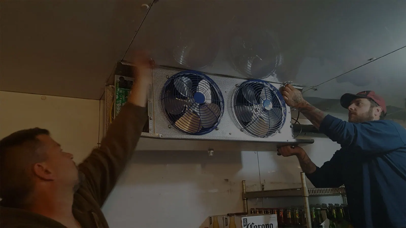 King technicians working on a commercial refrigeration unit