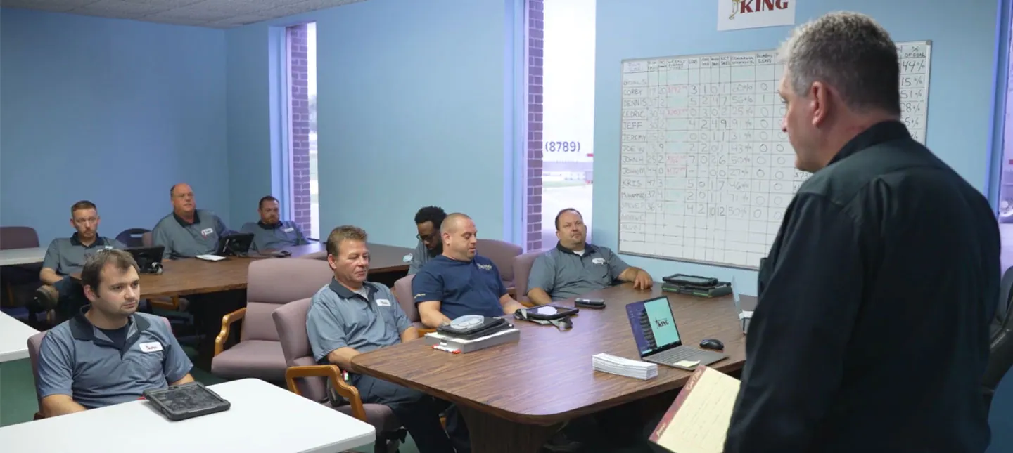 A King training session in a conference room