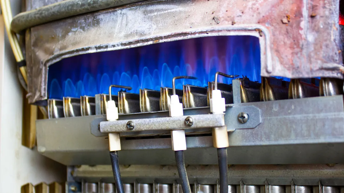 Close-up of furnace burners during a tune-up